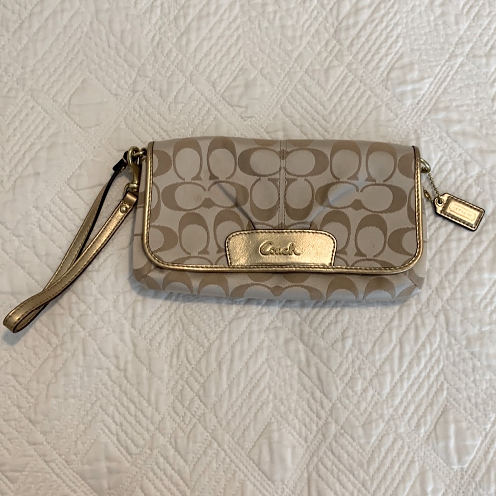 Gold/tan monogrammed Coach clutch/wristlet - excellent condition